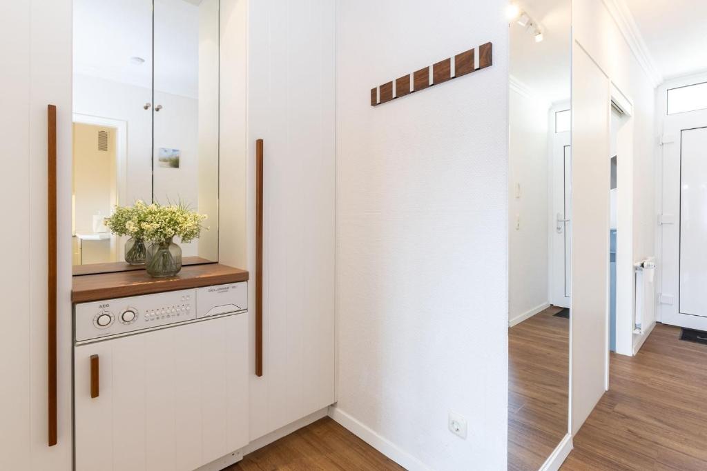 Kuchyň nebo kuchyňský kout v ubytování Grömitz Center Wohnung 763