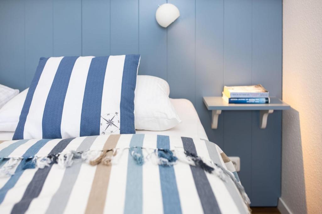 Postel nebo postele na pokoji v ubytování Grömitz Center Wohnung 763