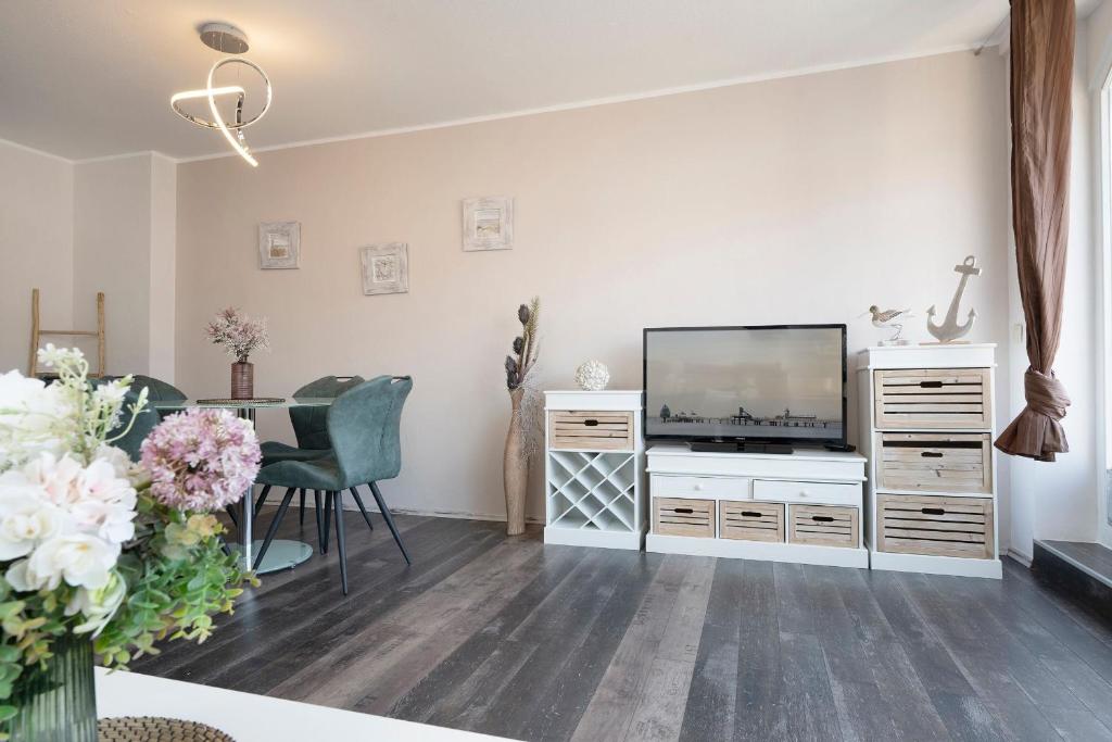TV a/nebo společenská místnost v ubytování Sunny Side