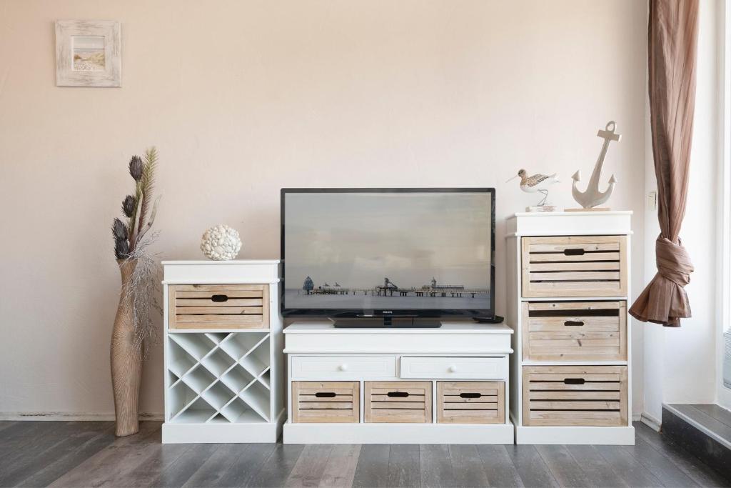 TV a/nebo společenská místnost v ubytování Sunny Side