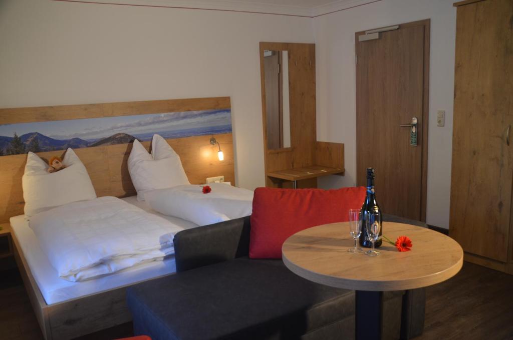 Postel nebo postele na pokoji v ubytování Hotel Seiserhof & Seiseralm