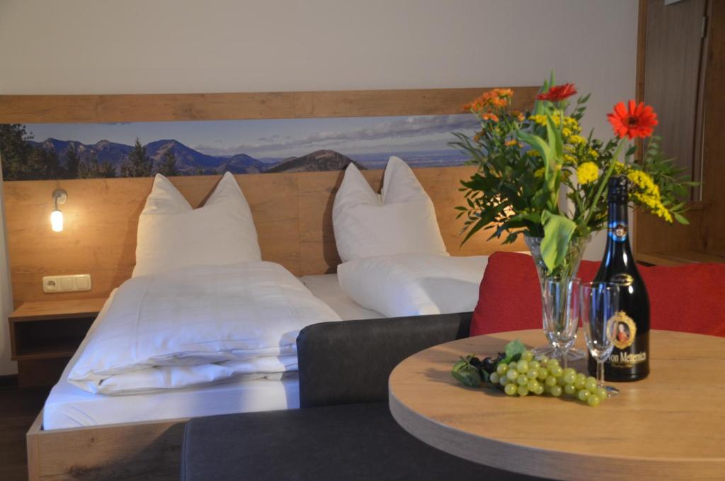 Postel nebo postele na pokoji v ubytování Hotel Seiserhof & Seiseralm