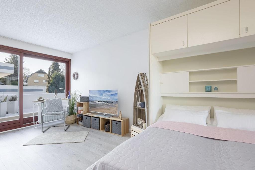 Postel nebo postele na pokoji v ubytování Sea-Loft
