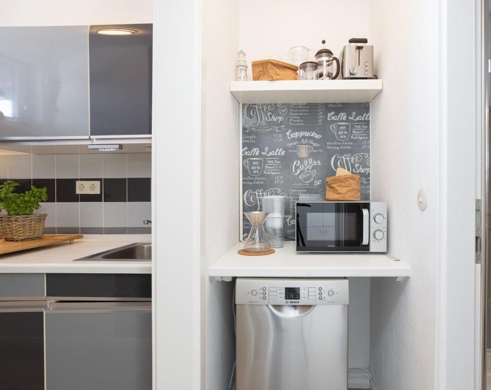 Kuchyň nebo kuchyňský kout v ubytování Sea-Loft
