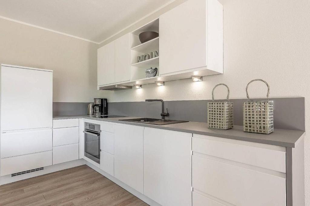 Kuchyň nebo kuchyňský kout v ubytování Sonne und Meer Wohnung 1