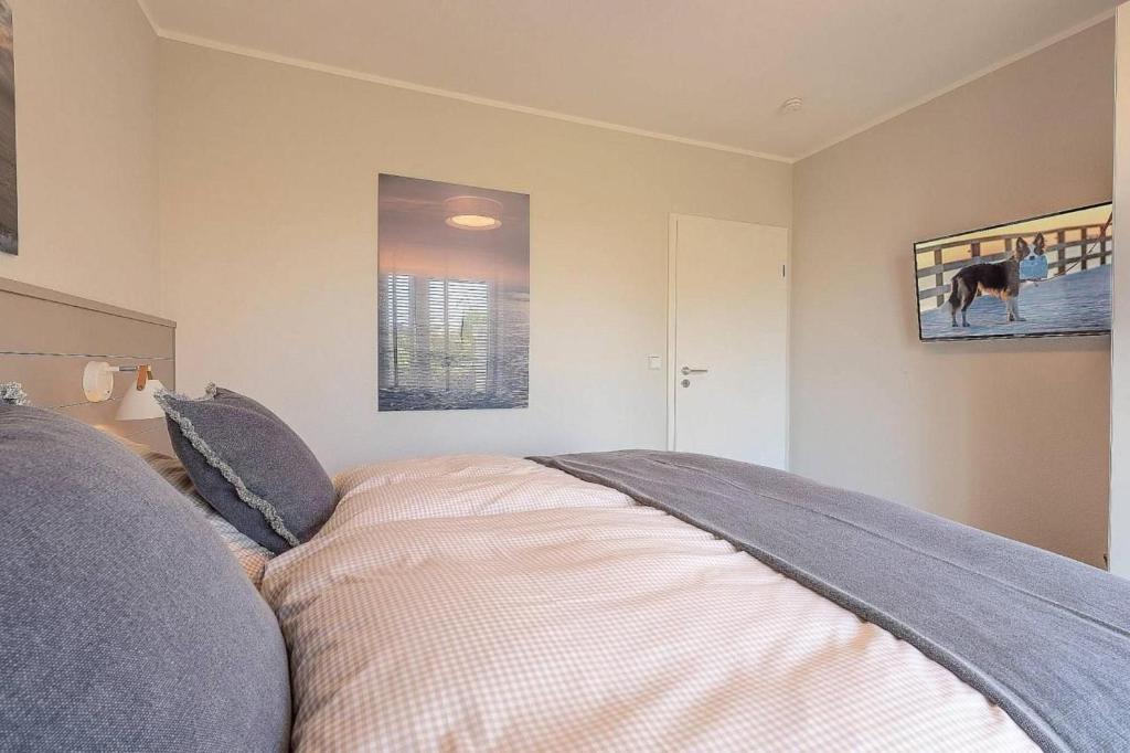 Postel nebo postele na pokoji v ubytování Sonne und Meer Wohnung 1