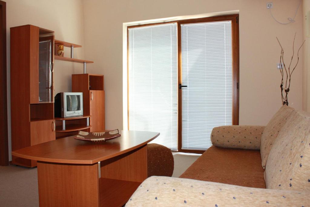 TV a/nebo společenská místnost v ubytování Hotel Milan