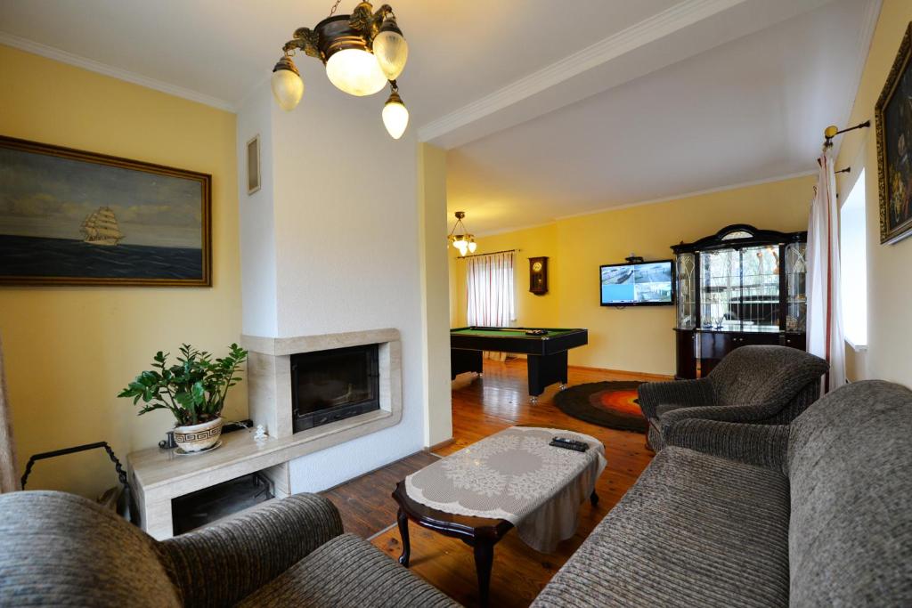 Χώρος καθιστικού στο Rambyno apartamentai