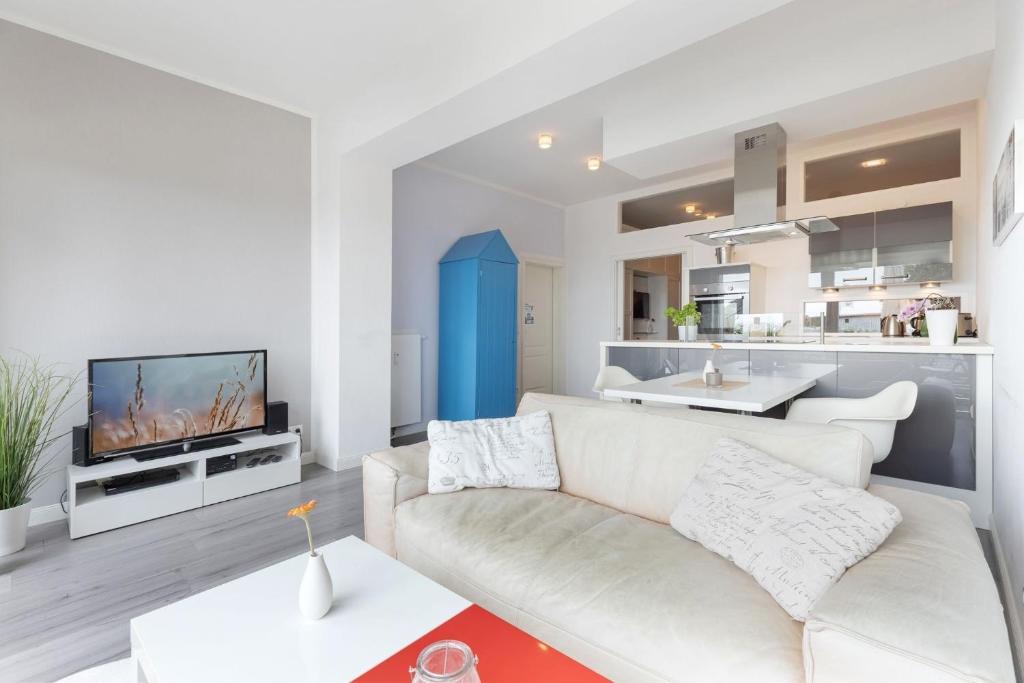 TV a/nebo společenská místnost v ubytování First Floor