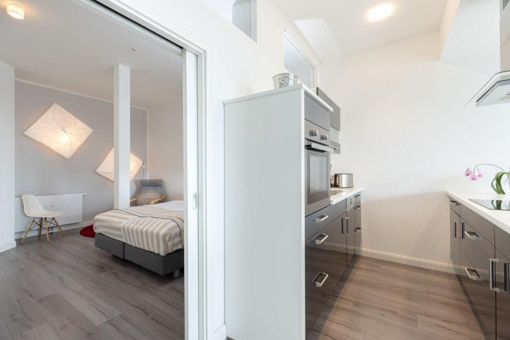 Kuchyň nebo kuchyňský kout v ubytování First Floor