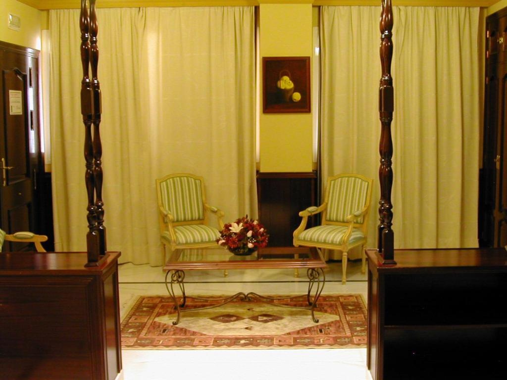 Posezení v ubytování Hotel Las Acacias