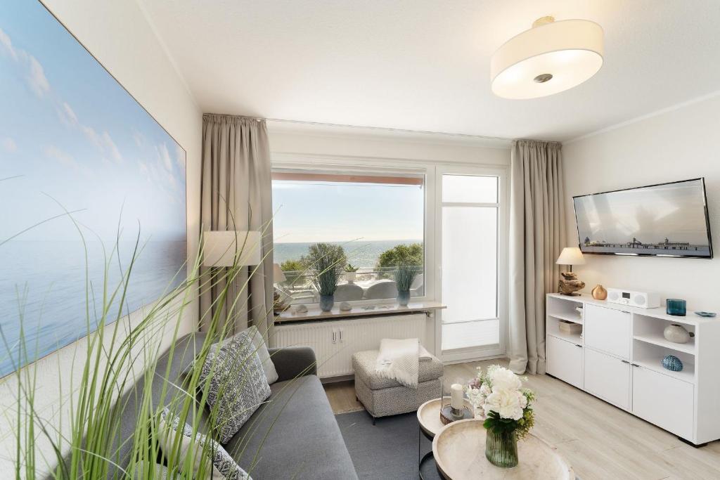 TV a/nebo společenská místnost v ubytování Strandschloss Horizont