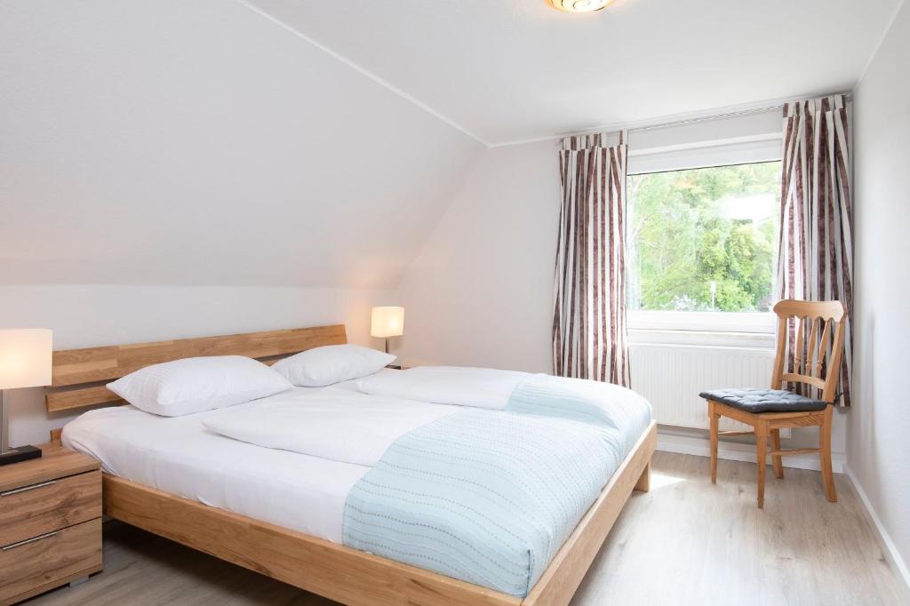 Postel nebo postele na pokoji v ubytování Haus Sonnenberg
