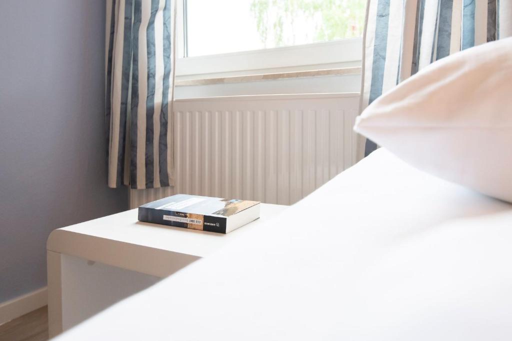 Postel nebo postele na pokoji v ubytování Haus Sonnenberg