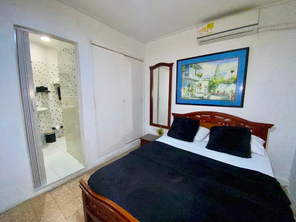Postel nebo postele na pokoji v ubytování Habitación Cerca de aeropuerto