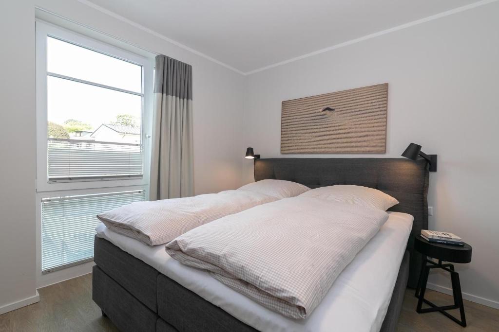 Postel nebo postele na pokoji v ubytování Haffkamp 23 Wohnung 3