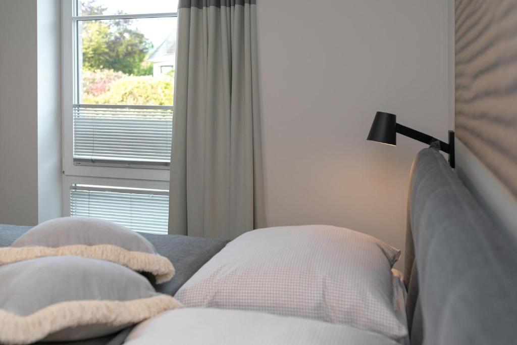 Postel nebo postele na pokoji v ubytování Haffkamp 23 Wohnung 3