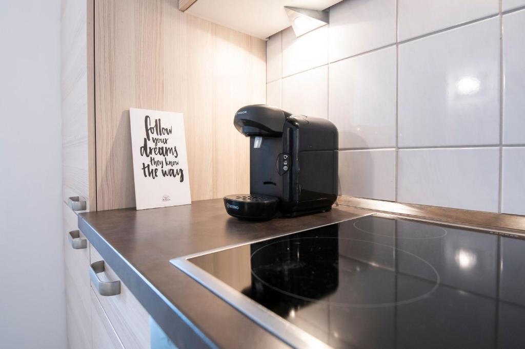 Kuchyň nebo kuchyňský kout v ubytování Haus Seebad Lieblingsplatz Grömitz