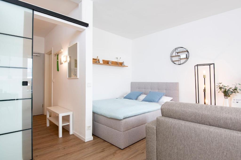 Postel nebo postele na pokoji v ubytování Haus Seebad Lieblingsplatz Grömitz