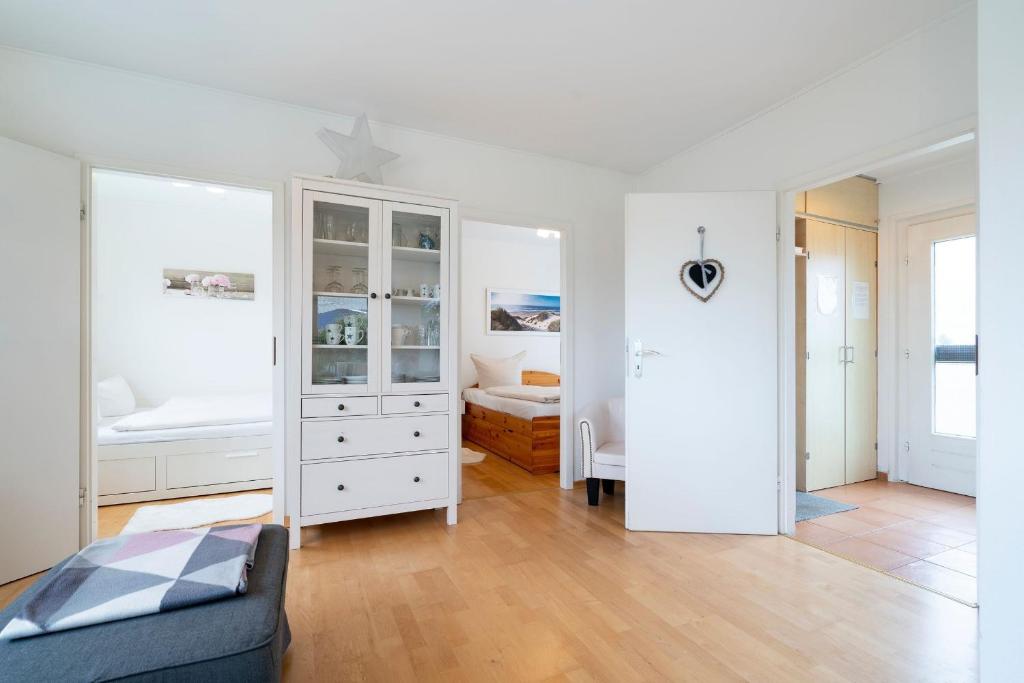 Postel nebo postele na pokoji v ubytování Cottage am Meer