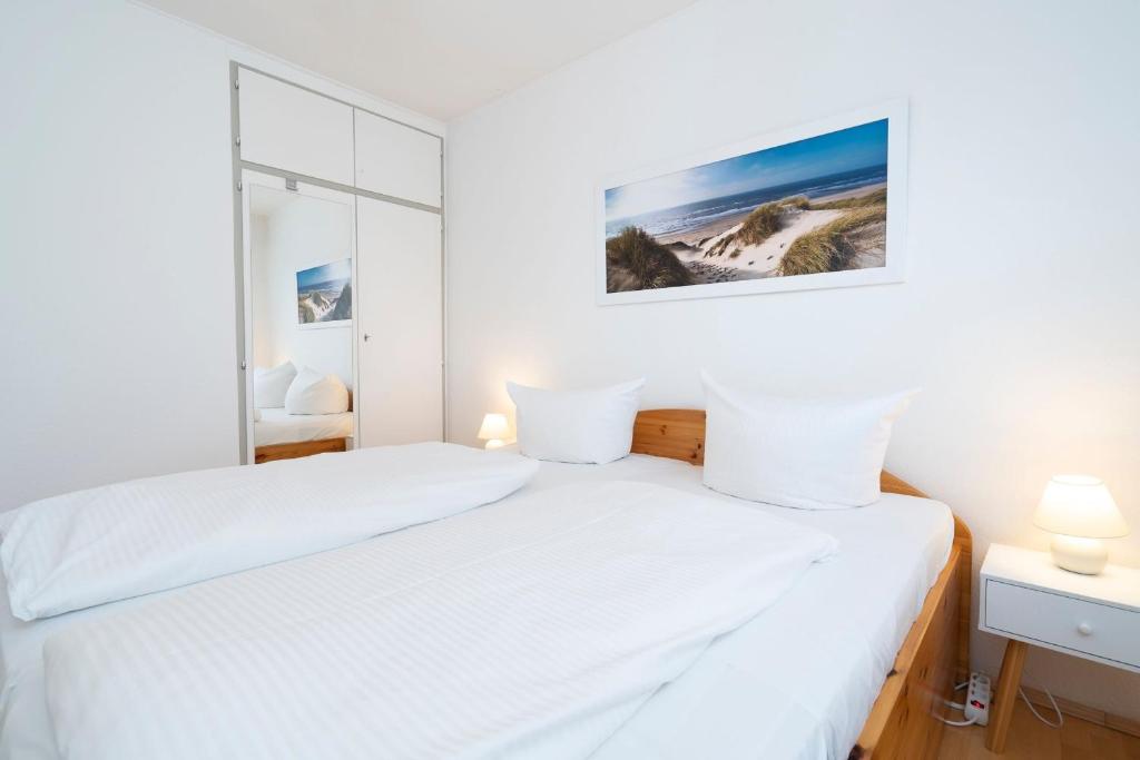 Postel nebo postele na pokoji v ubytování Cottage am Meer