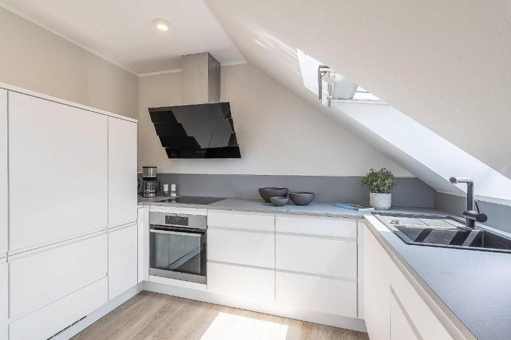 Kuchyň nebo kuchyňský kout v ubytování Sonne und Meer Wohnung 3