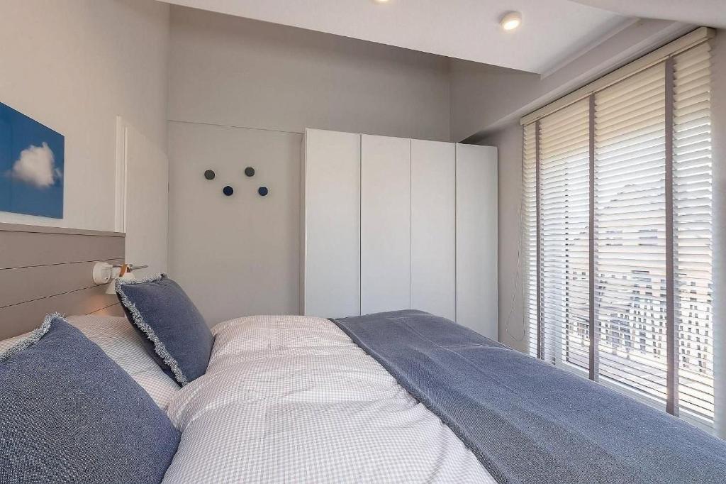 Postel nebo postele na pokoji v ubytování Sonne und Meer Wohnung 3