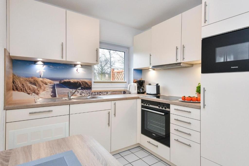 Kuchyň nebo kuchyňský kout v ubytování Lindenbuschen 2 Wohnung 2