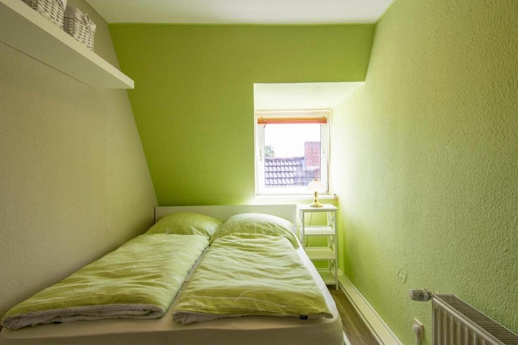 Postel nebo postele na pokoji v ubytování Heckenröschen