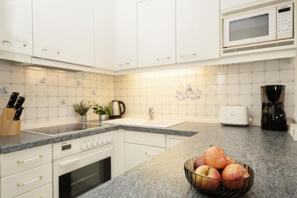 Kuchyň nebo kuchyňský kout v ubytování Grömitz Center Wohnung 759