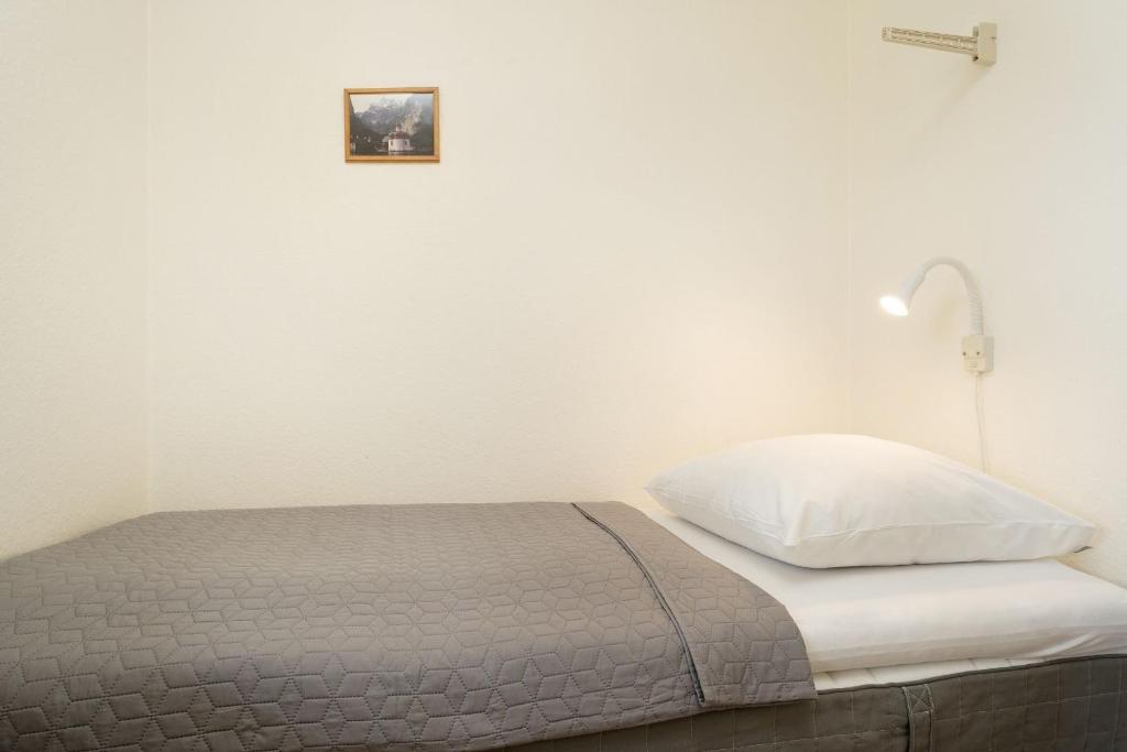 Postel nebo postele na pokoji v ubytování Grömitz Center Wohnung 759