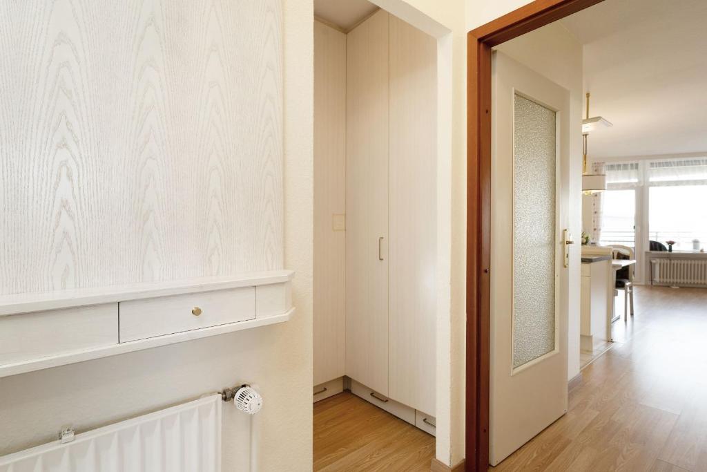 Postel nebo postele na pokoji v ubytování Grömitz Center Wohnung 759