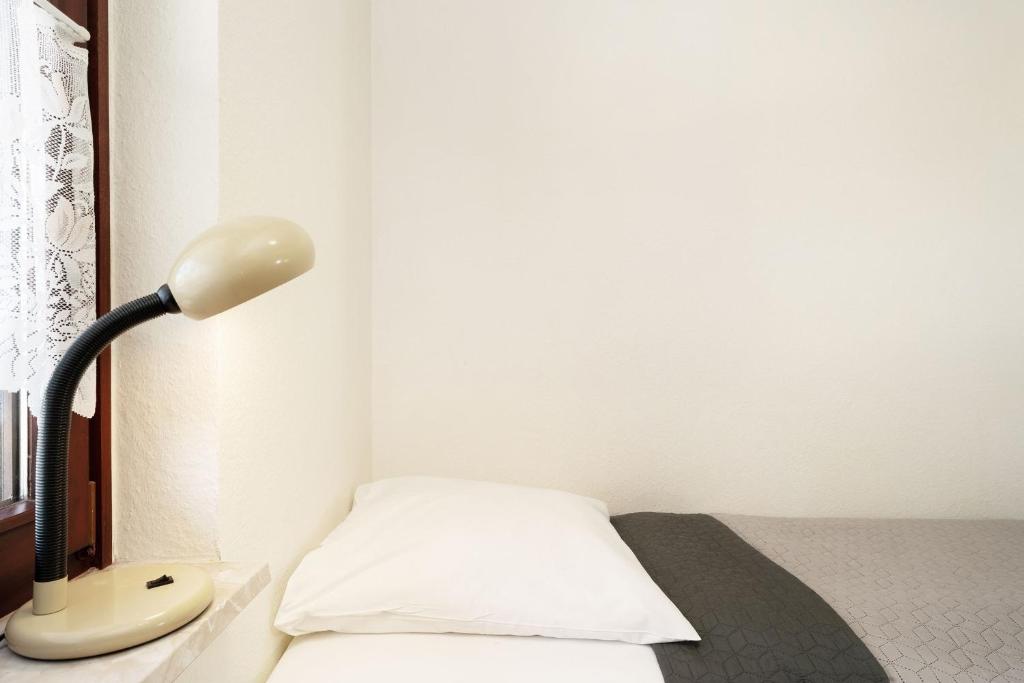 Postel nebo postele na pokoji v ubytování Grömitz Center Wohnung 759