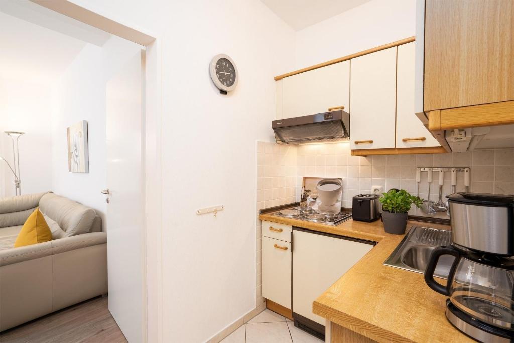 Kuchyň nebo kuchyňský kout v ubytování Haus Seebrise- Wohnung 7
