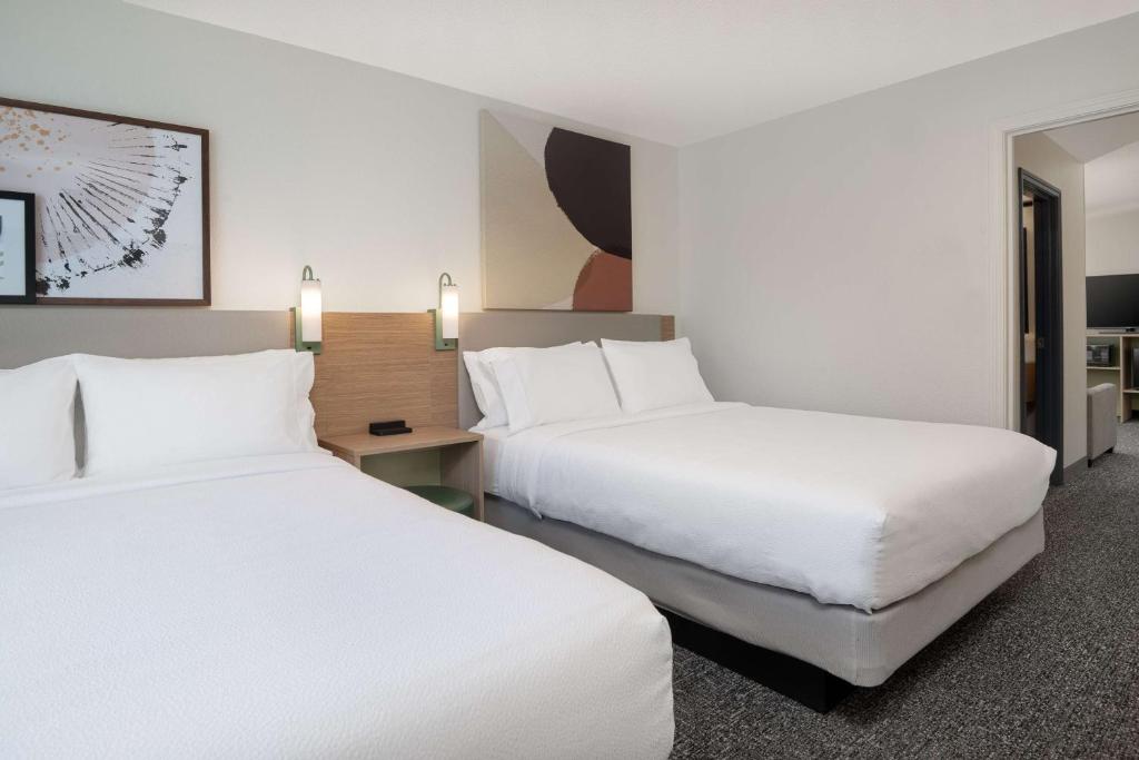 Ein Bett oder Betten in einem Zimmer der Unterkunft Spark by Hilton Summerville