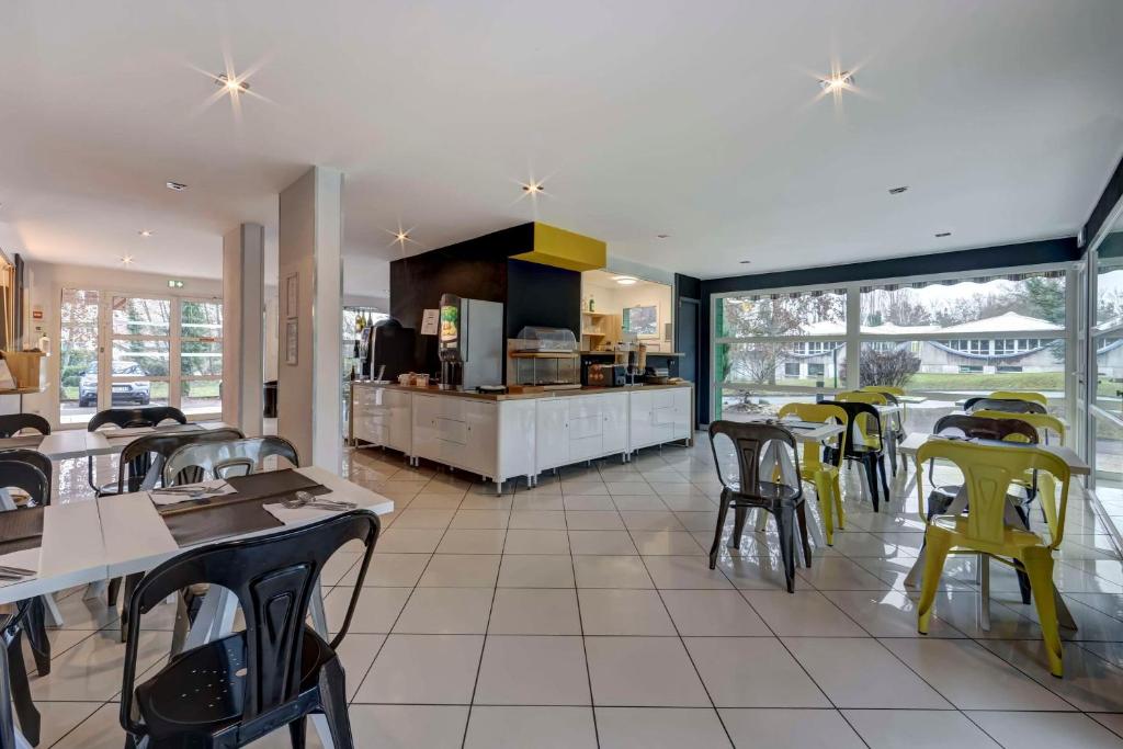 Restaurace v ubytování Comfort Aparthotel Divonne L'Orée du Parc