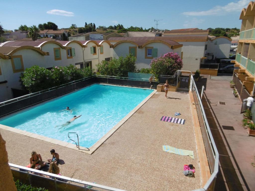 Photo de la galerie de l'établissement Gruissan : T2 Cabine Climatisé, Parking, Près du Vieux Village - FR-1-796-91, à Gruissan