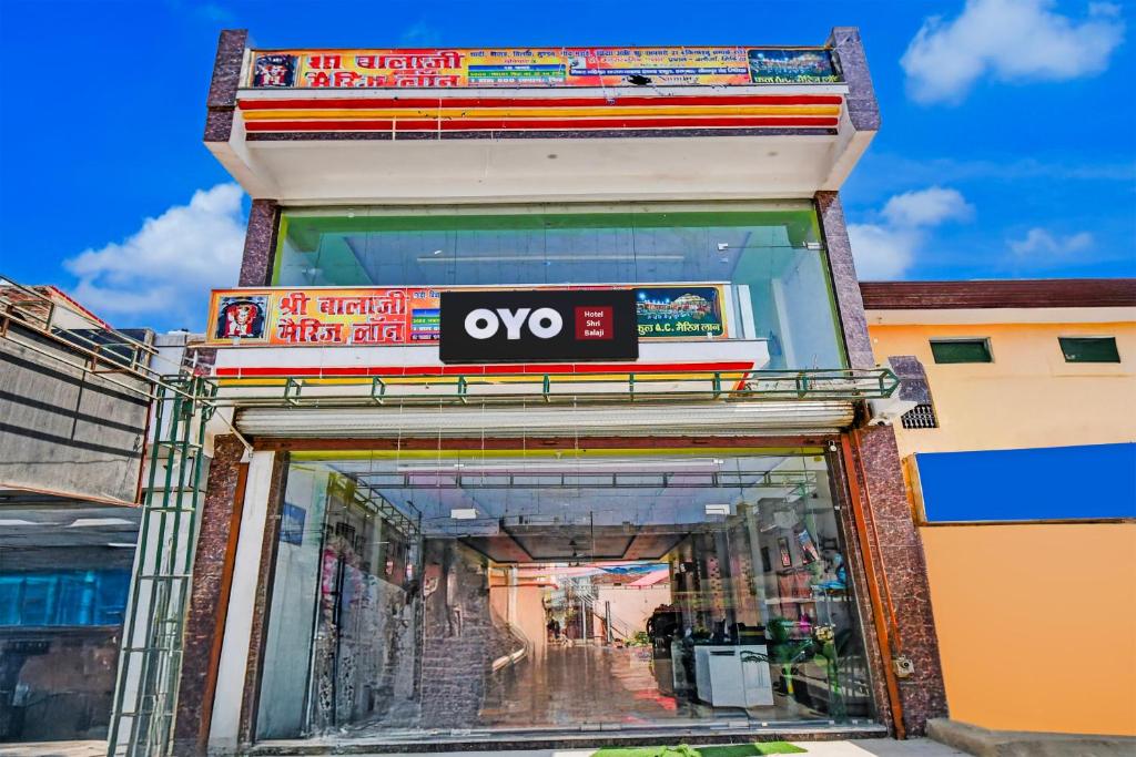 a store front with an open door at Hotel O Shri Balaji Marriage Lawn And Hotel in Sītāpur