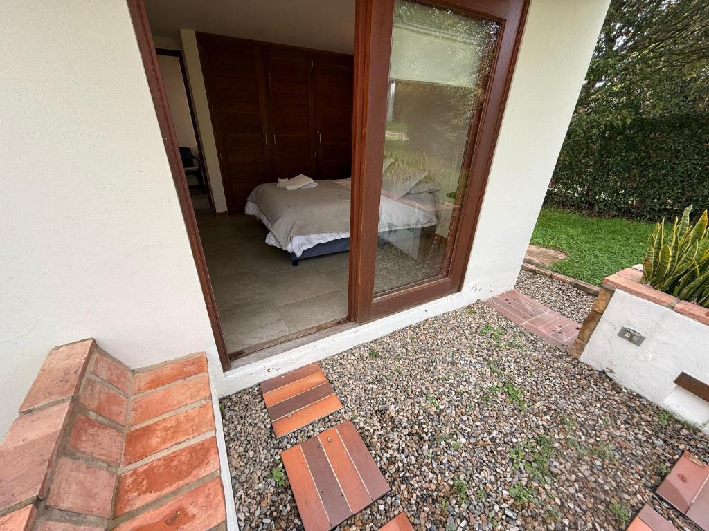 Postel nebo postele na pokoji v ubytování Las Marías ApartaSuites
