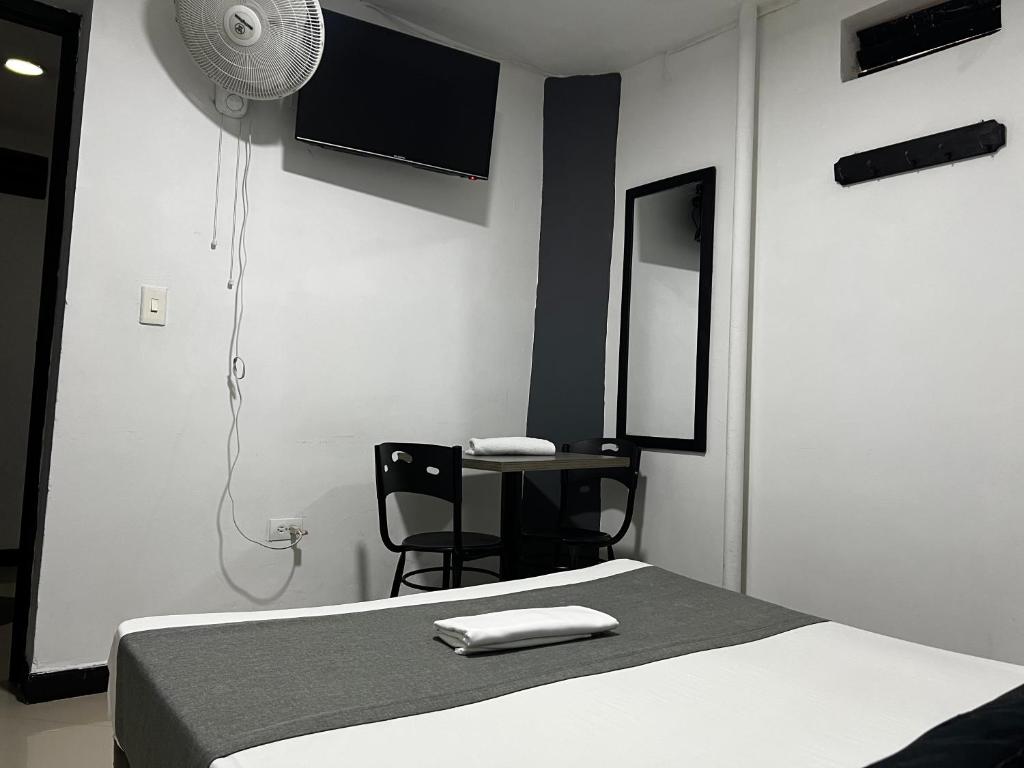 TV a/nebo společenská místnost v ubytování Hotel Laureles Aburrá