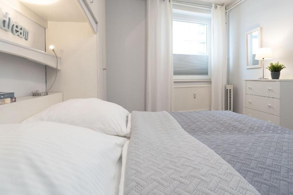 Postel nebo postele na pokoji v ubytování Solymar Wohnung 22