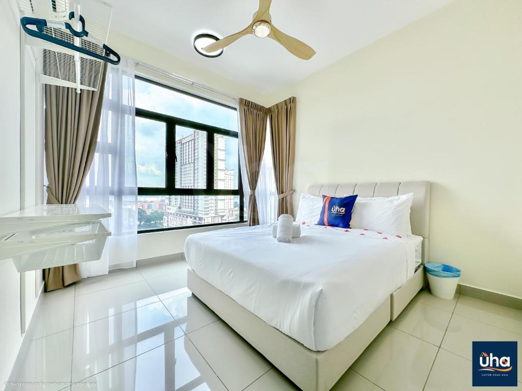 Ένα ή περισσότερα κρεβάτια σε δωμάτιο στο Citywood by RR JBcity