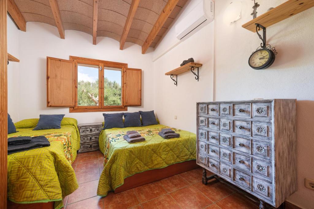 Cama o camas de una habitación en Cas Mostatxet - Sencelles