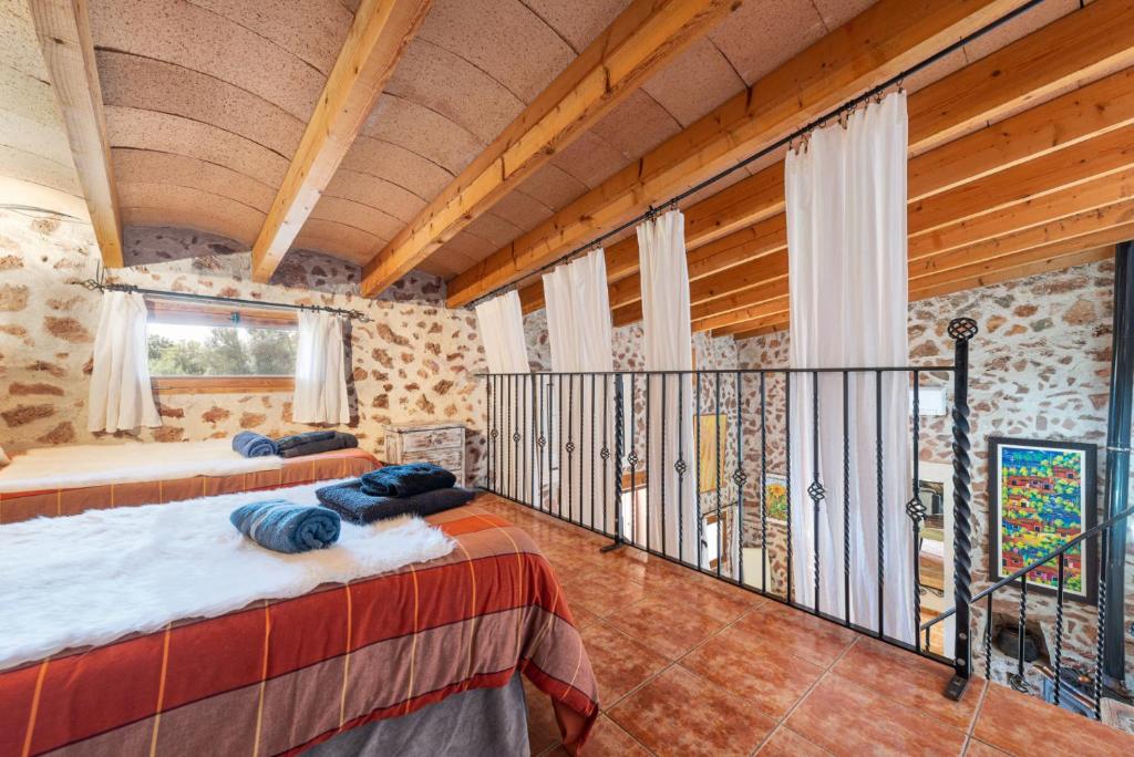 Cama o camas de una habitación en Cas Mostatxet - Sencelles