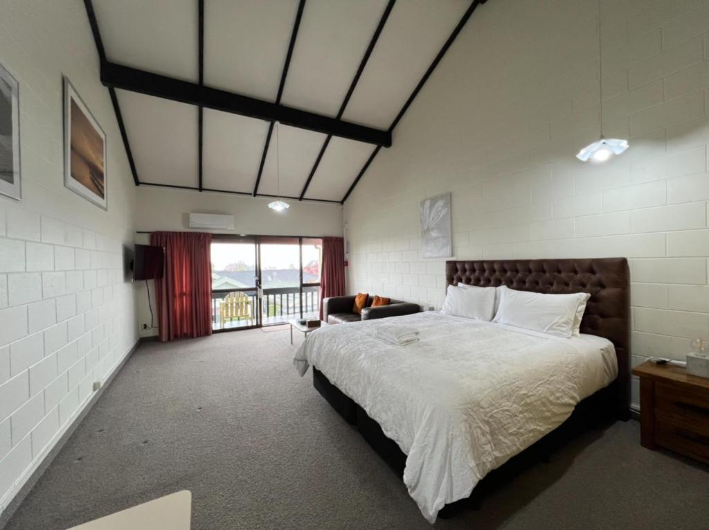 Postel nebo postele na pokoji v ubytování Mountain View Motel