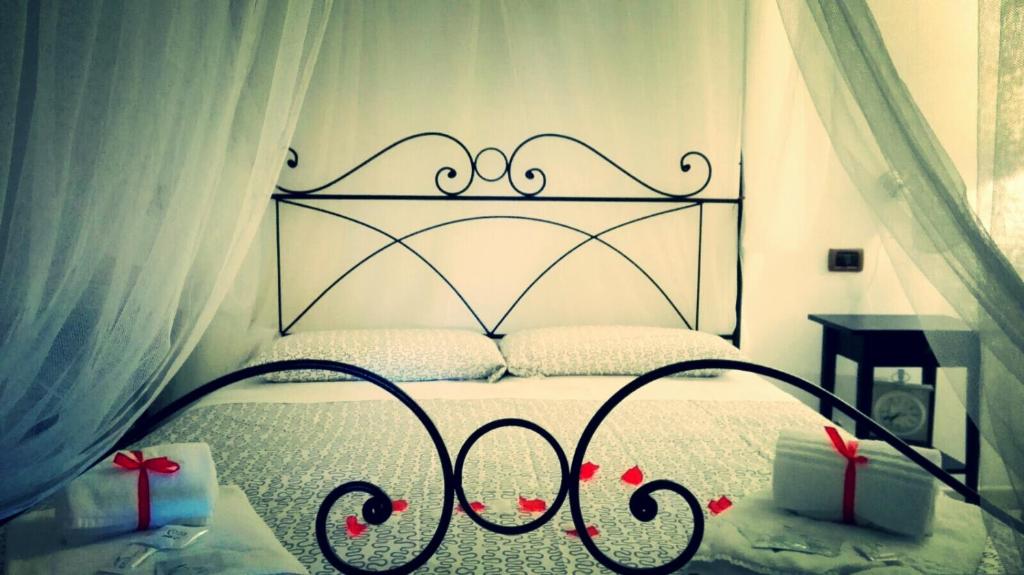 Postel nebo postele na pokoji v ubytování Elegance B&B