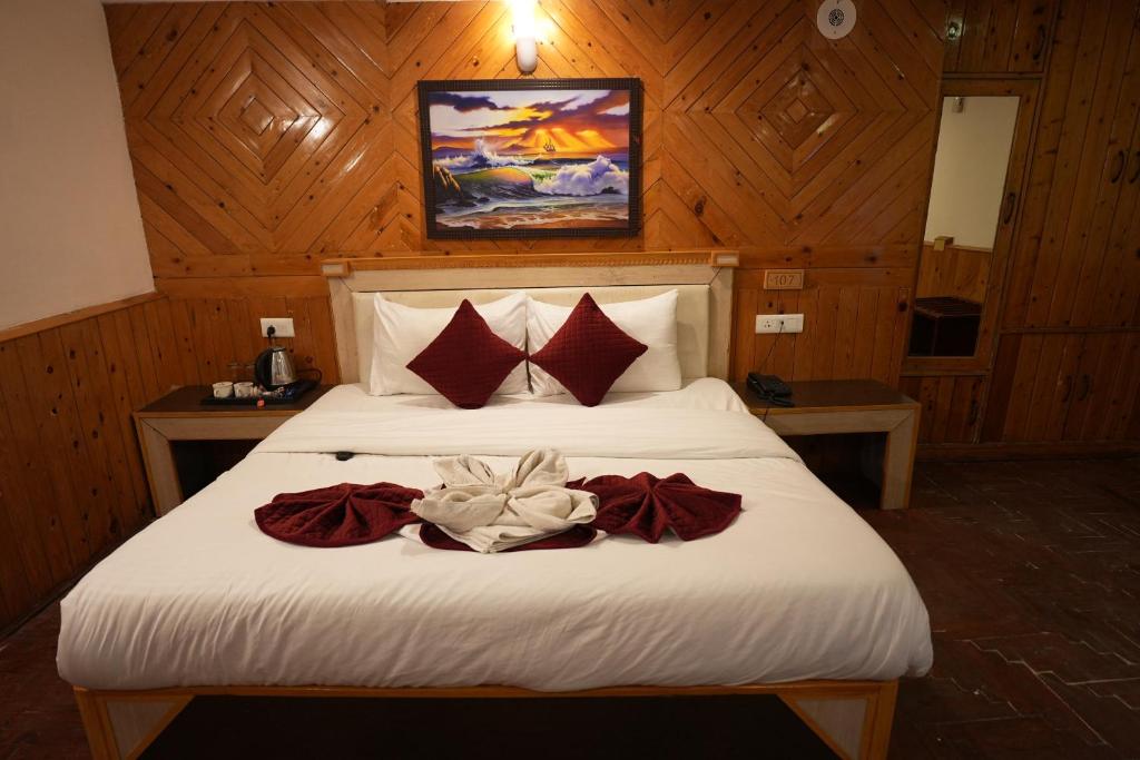 Letto o letti in una camera di Hotel Monal