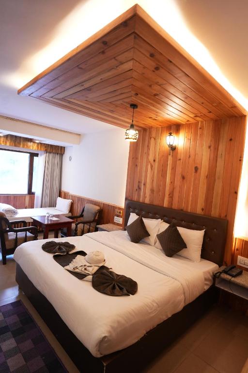 Letto o letti in una camera di Hotel Monal