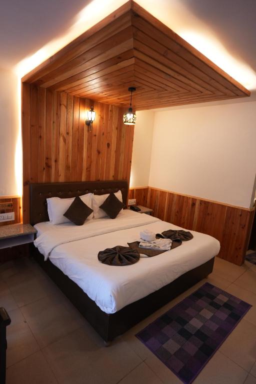 Letto o letti in una camera di Hotel Monal