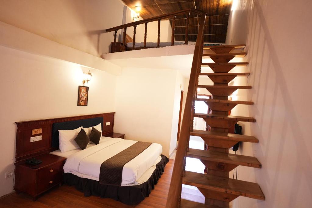 Letto o letti in una camera di Hotel Monal